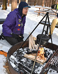 Build a big fire to keep you warm during winter camping